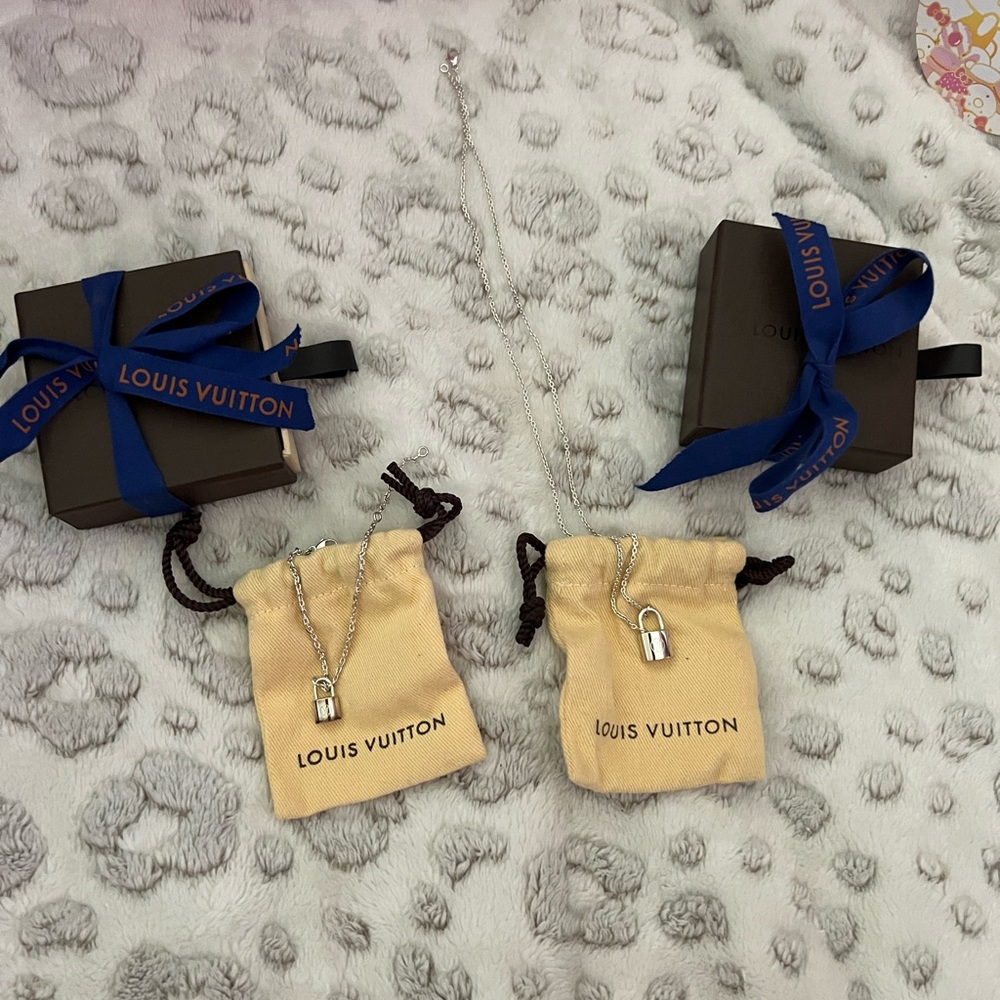 Authentic LV sterling silver LV bracelet & matching necklace that will retire